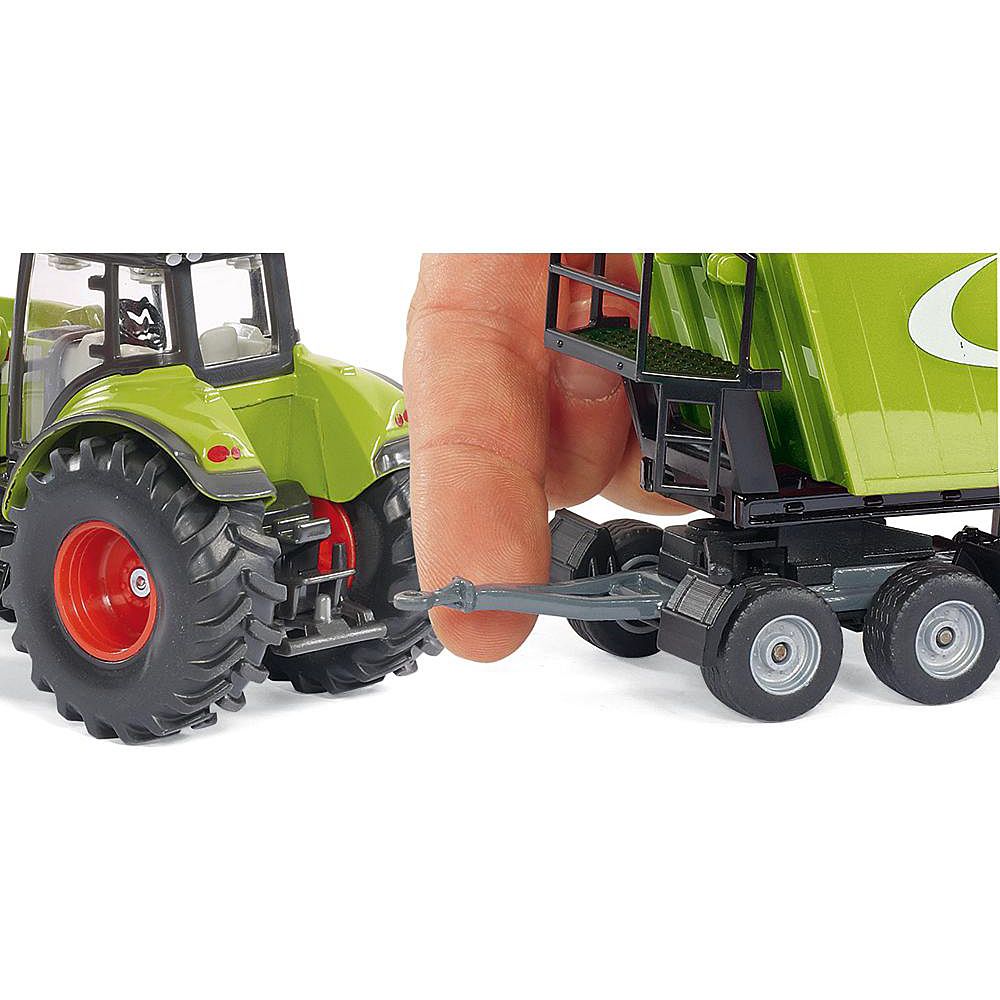 Трактор Claas Axion 850 с преден товарач и с ремарке