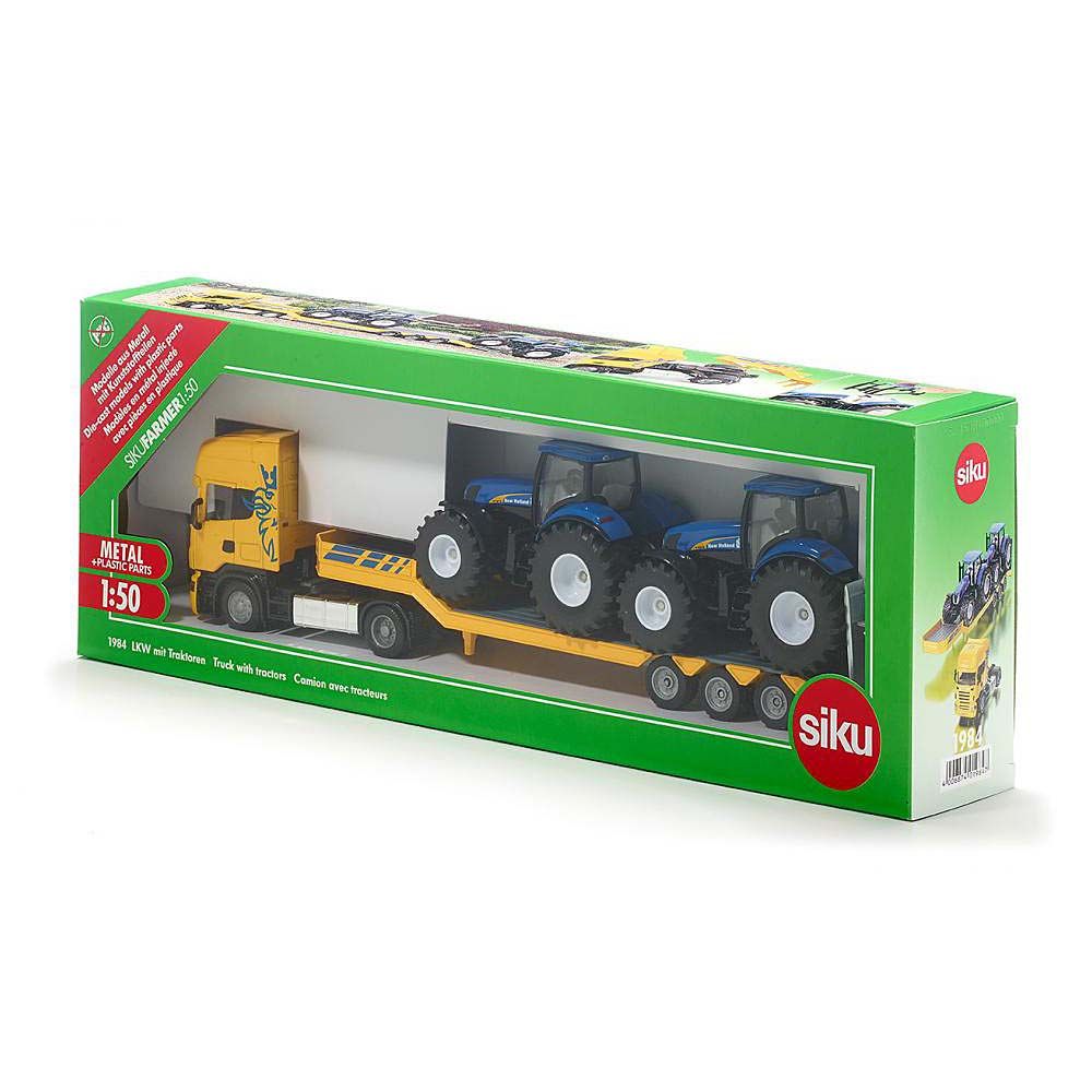 Тир влекач SCANIA натоварен с два трактора New Holland