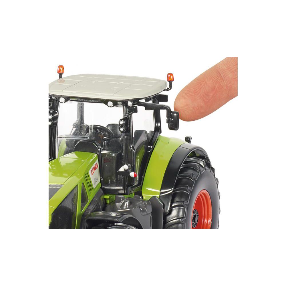 Трактор Claas Axion 950
