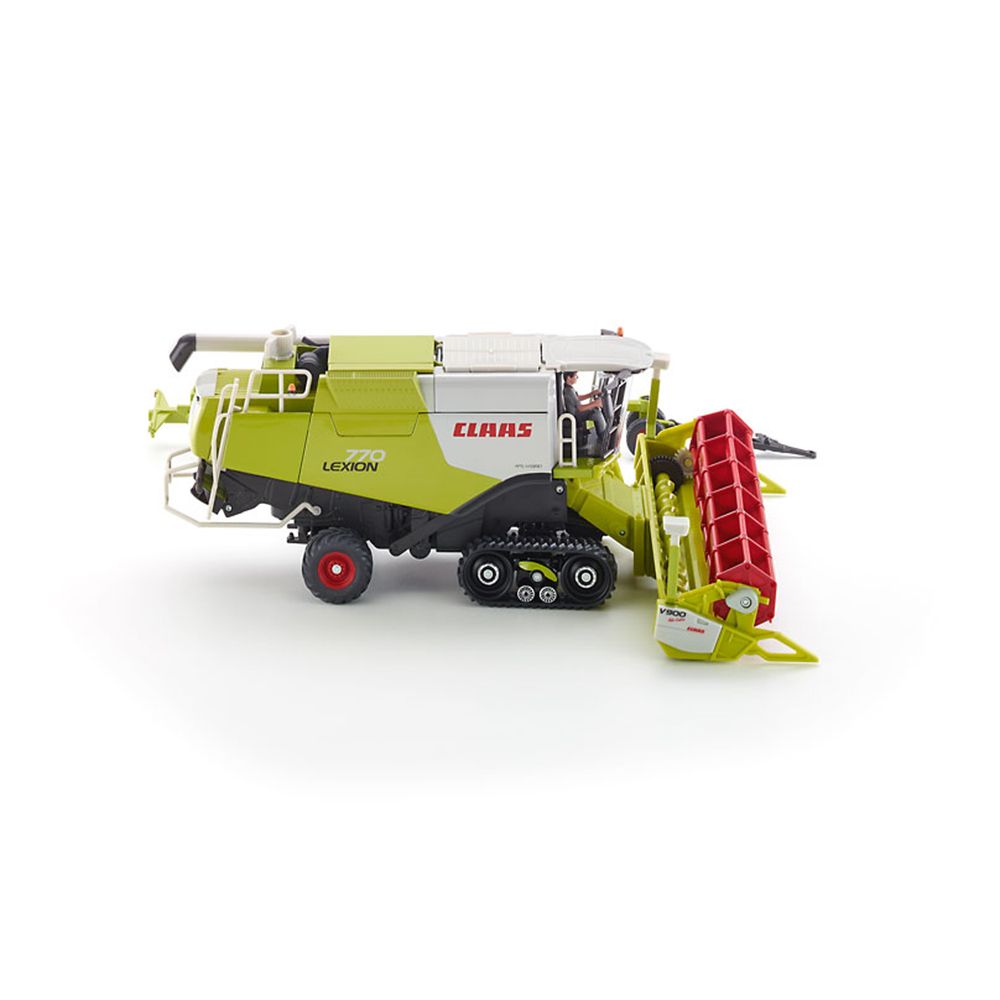 Комбайн Claas Lexion с ремарке