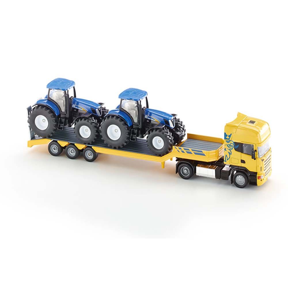Тир влекач SCANIA натоварен с два трактора New Holland