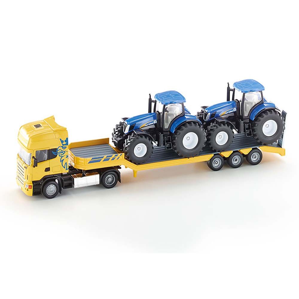 Тир влекач SCANIA натоварен с два трактора New Holland