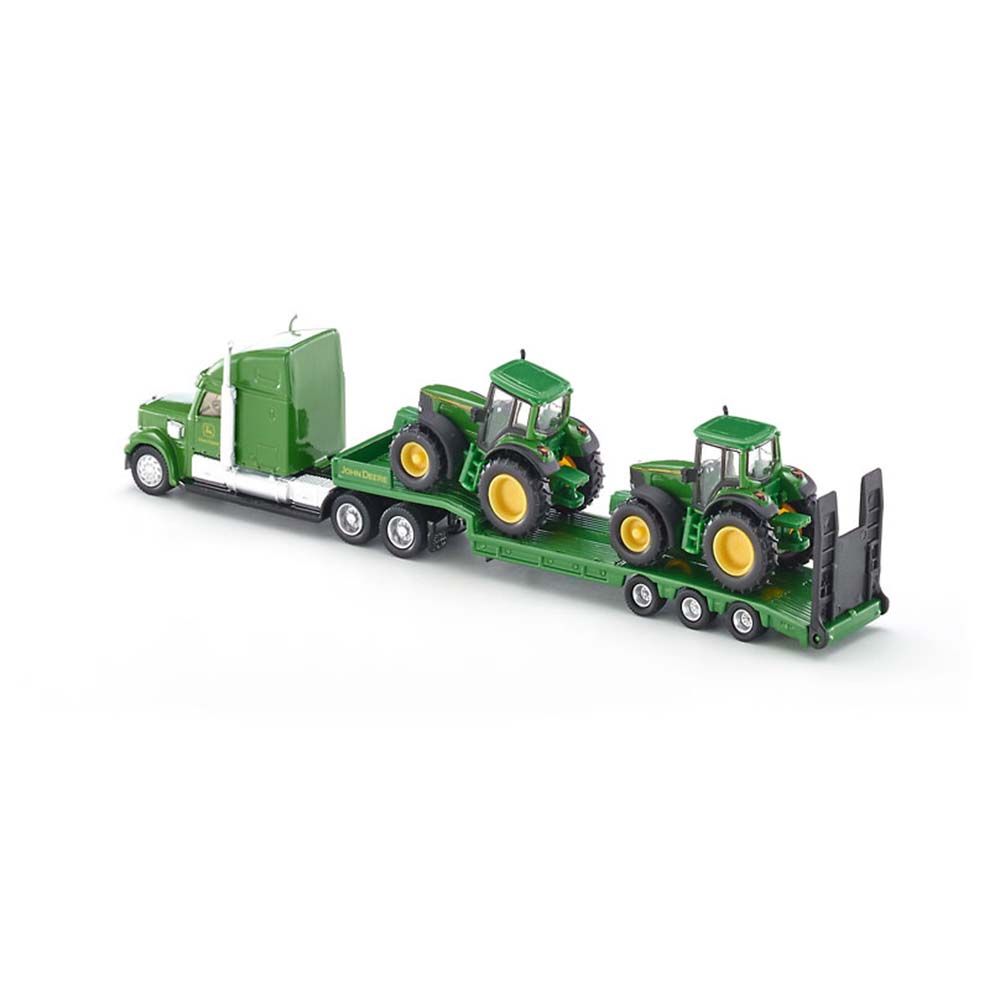 Тир влекач натоварен с два трактора John Deere