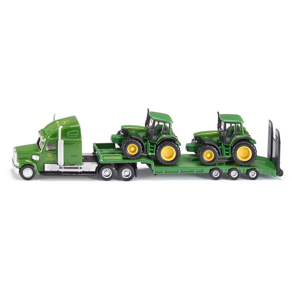 Тир влекач натоварен с два трактора John Deere