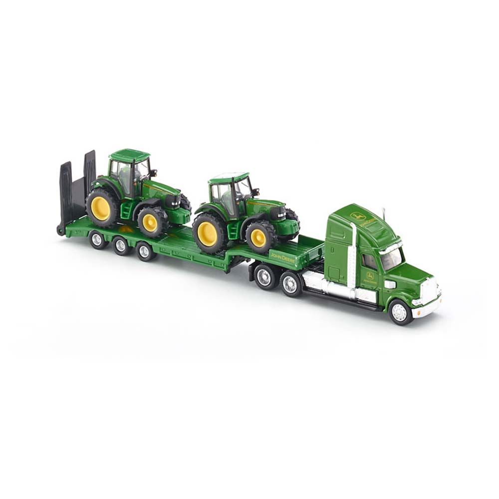 Тир влекач натоварен с два трактора John Deere