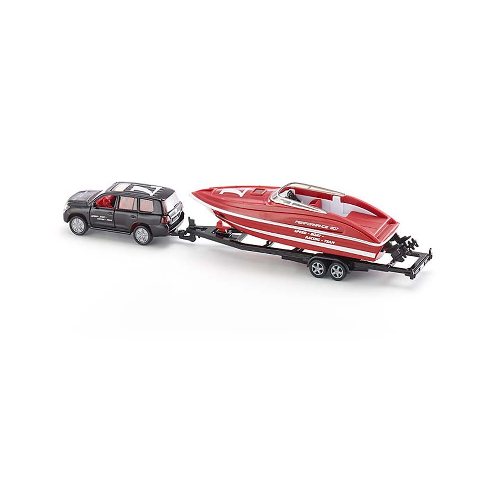 Toyota Land Cruiser с платформа, натоварена със спортна лодка