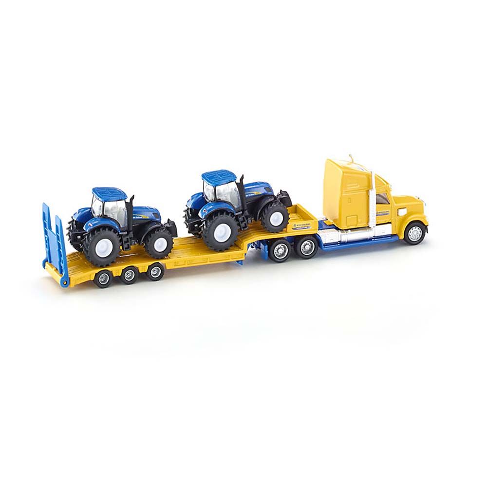 Тир влекач натоварен с два трактора New Holland
