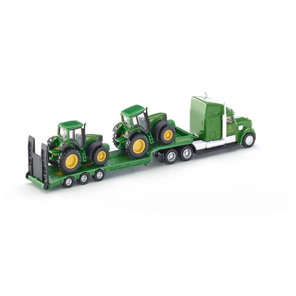 Тир влекач натоварен с два трактора John Deere
