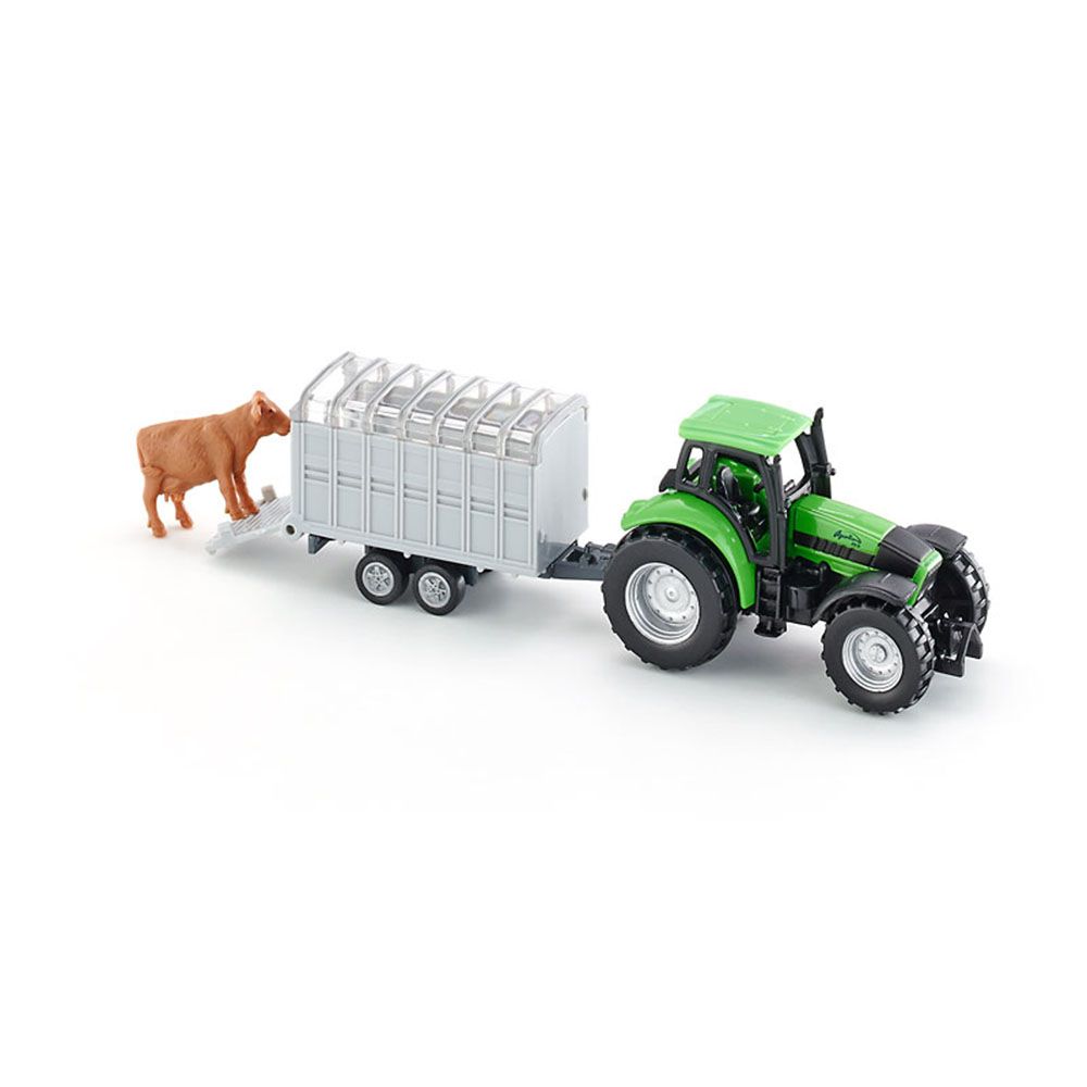 Трактор с ремарке за превозване на животни